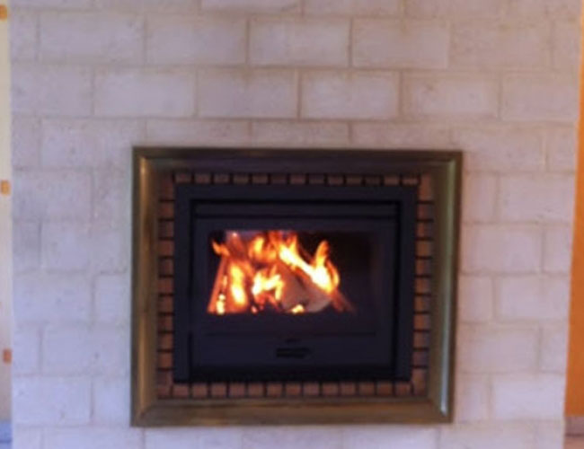 Installation d'un insert bois Dovre à Arras