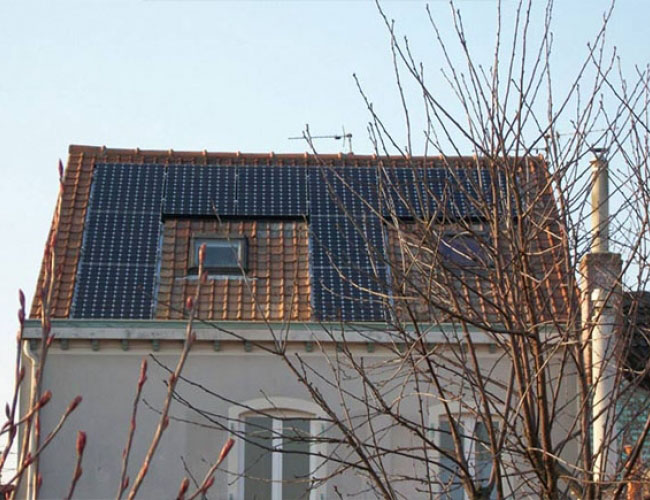 Pose d'un velux et de panneaux photovoltaïques