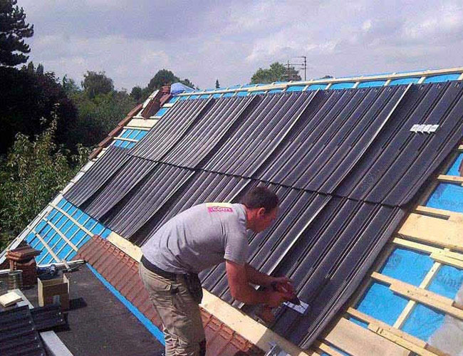 Installation de 16 panneaux solaires photovoltaïques