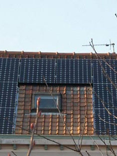 Pose d'un velux et de panneaux photovoltaïques